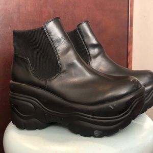Black booties platform soles.